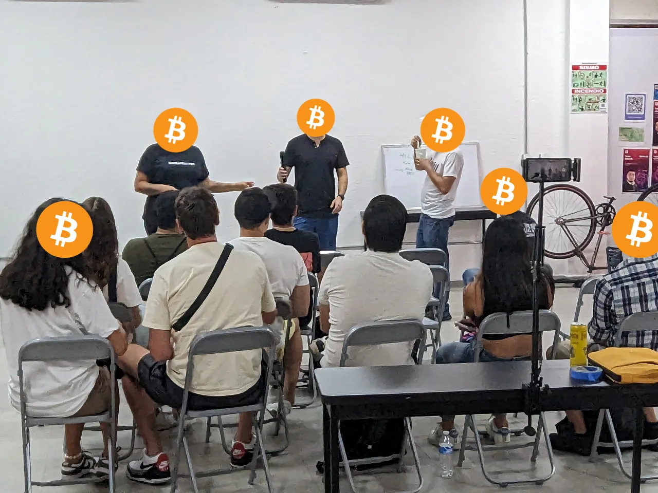 Attendees seated for a Bitcoin community presentation in Guadalajara